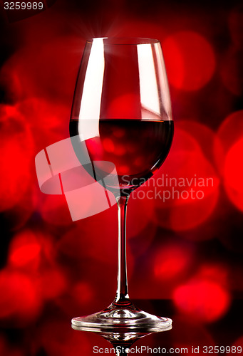 Image of Wine on red background