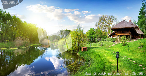 Image of River and house of log