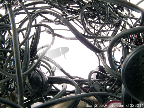 Image of Interlacing of the broken off wires of old headphones. Backgroun