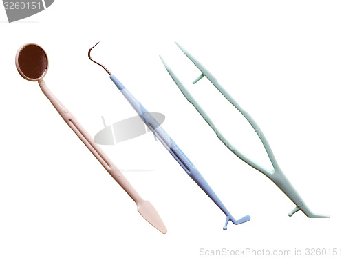 Image of Retro look Dentist tools isolated