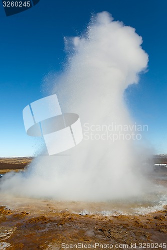 Image of Erupting geyser