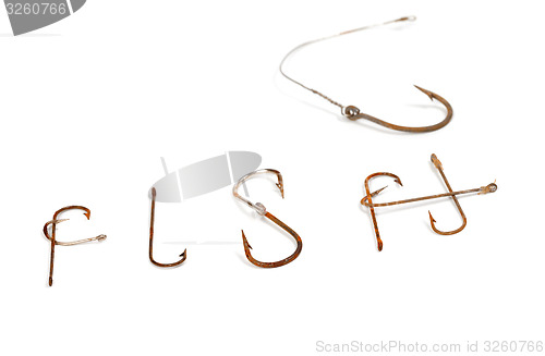 Image of Word F I S H composed of old rusty fish hooks