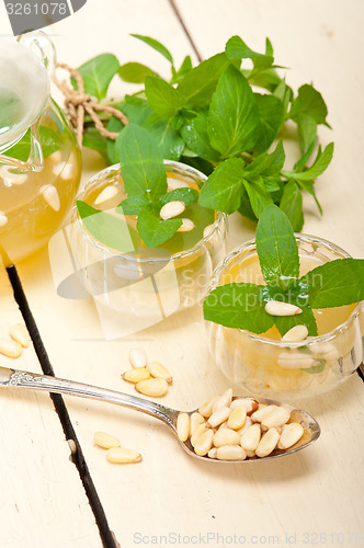 Image of Arab traditional mint and pine nuts tea