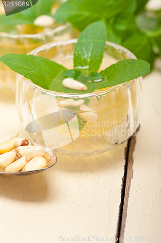 Image of Arab traditional mint and pine nuts tea