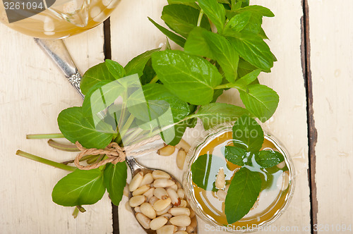 Image of Arab traditional mint and pine nuts tea