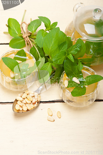 Image of Arab traditional mint and pine nuts tea