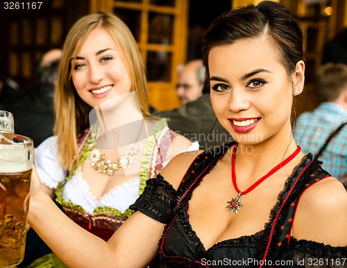 Image of Girls drinking beer at Oktoberfest