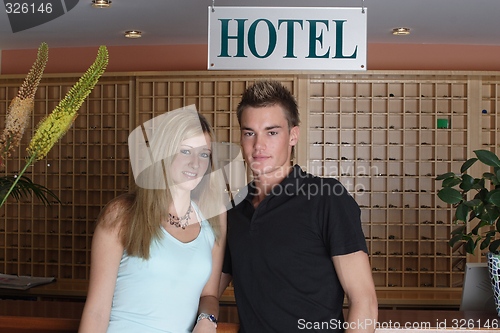 Image of Couple standing at reception
