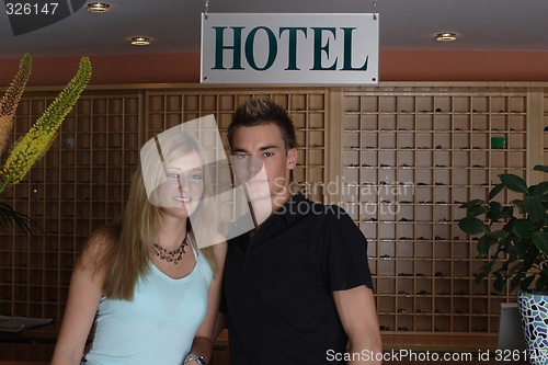 Image of Couple standing at reception