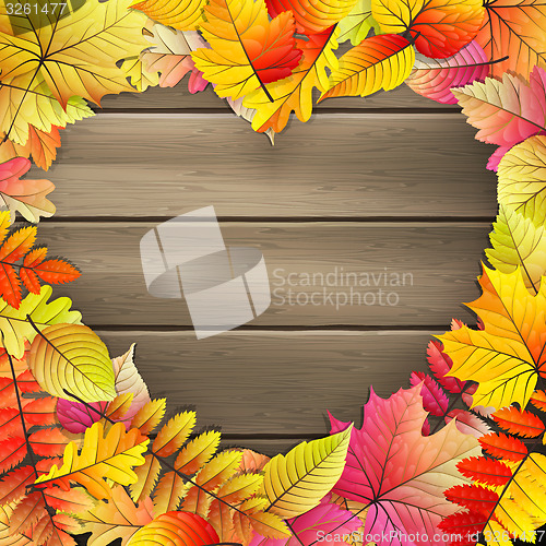 Image of Heart with colored Autumn leaves. EPS 10