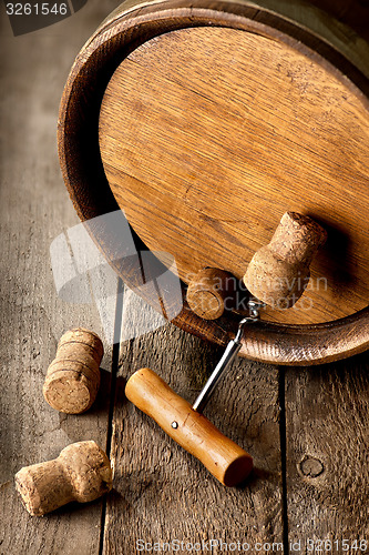 Image of Corkscrew and wooden cask