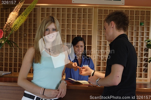 Image of Couple standing at reception