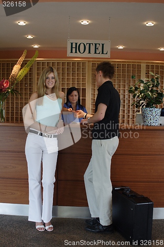 Image of Couple standing at reception