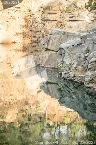 Image of stone and  reflections at a quarry