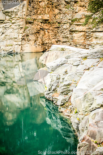 Image of stone and  reflections at a quarry