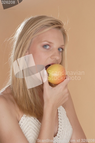 Image of Woman with apple