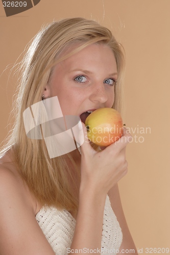 Image of Woman with apple