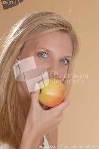 Image of Woman with apple