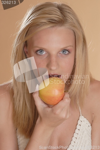 Image of Woman with apple