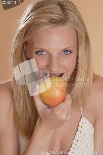 Image of Woman with apple