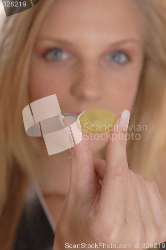 Image of Woman with grape