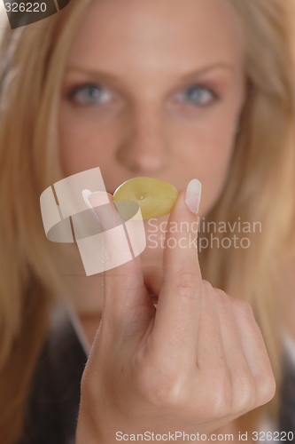 Image of Woman with grape