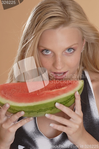 Image of Woman with melon