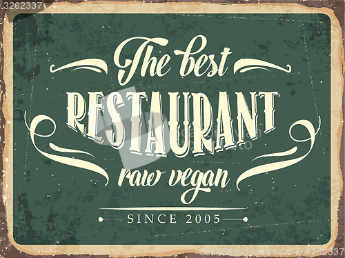 Image of Retro metal sign \" The best restaurant raw vegan\"