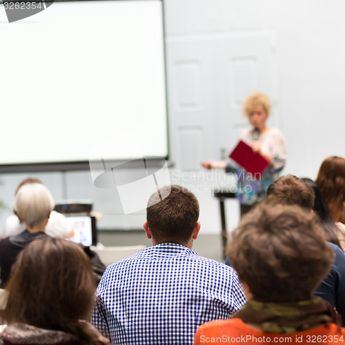 Image of Woman lecturing at university.