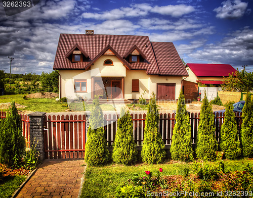 Image of Suburban House with garden 