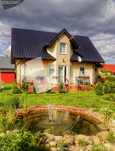 Image of Suburban House with garden 