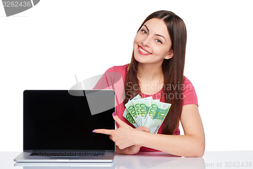 Image of Woman showing laptop screen