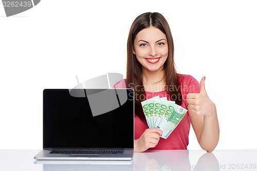 Image of Woman showing  laptop screen