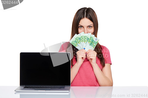 Image of Woman showing  laptop screen