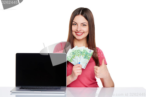 Image of Woman showing  laptop screen