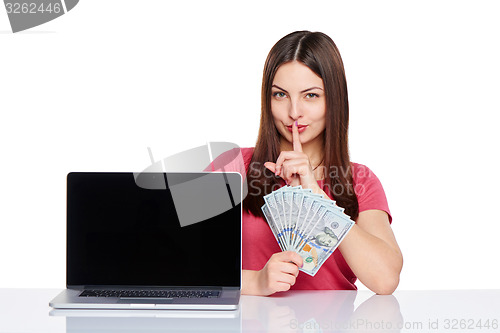 Image of Woman showing  laptop screen