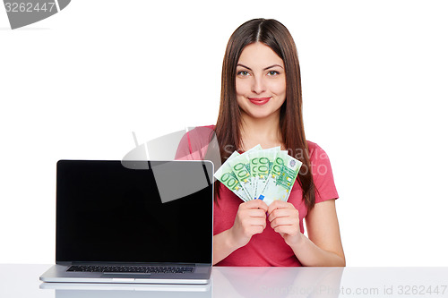 Image of Woman showing  laptop screen