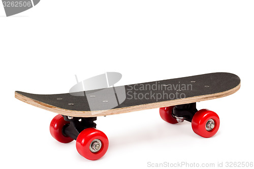 Image of skateboard with red wheels