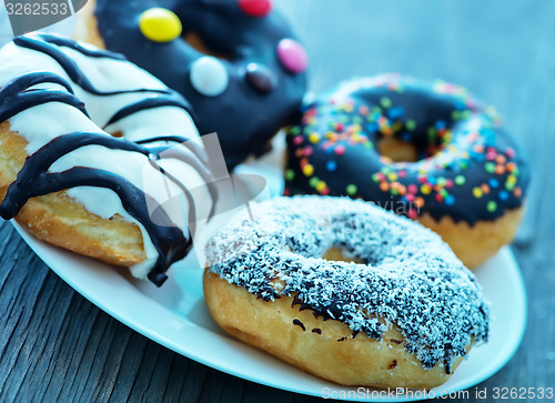 Image of donuts in white box