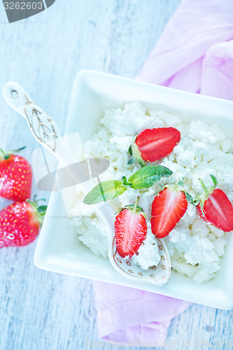 Image of cottage with strawberry