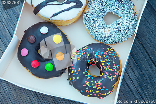 Image of donuts in white box