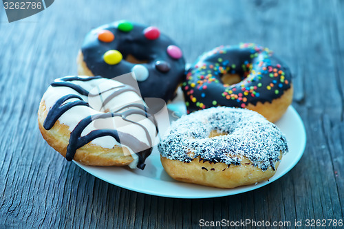 Image of donuts in white box