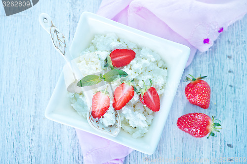 Image of cottage with strawberry