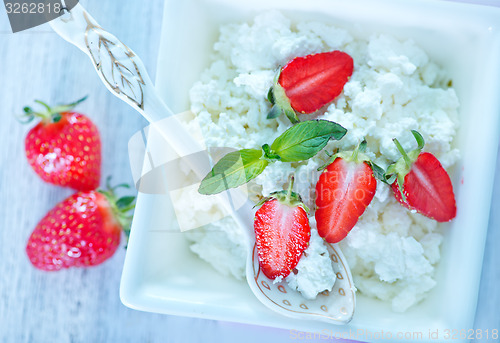 Image of cottage with strawberry