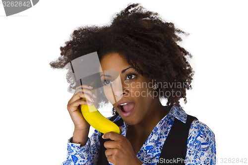 Image of Female afro american with banana