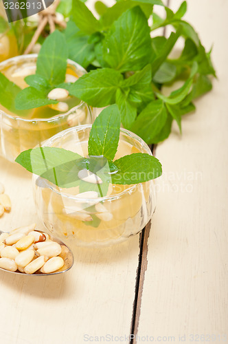 Image of Arab traditional mint and pine nuts tea