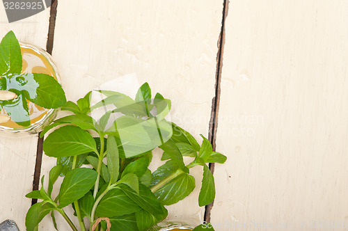 Image of Arab traditional mint and pine nuts tea