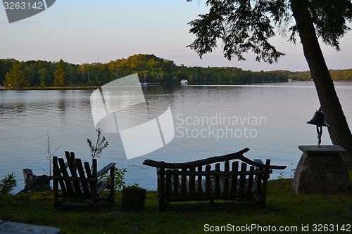 Image of Bench by a lake