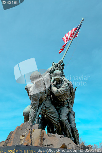 Image of Statue of soldiers with the American Flag