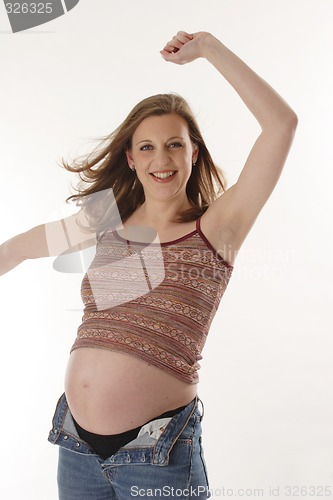 Image of Pregnant woman dancing